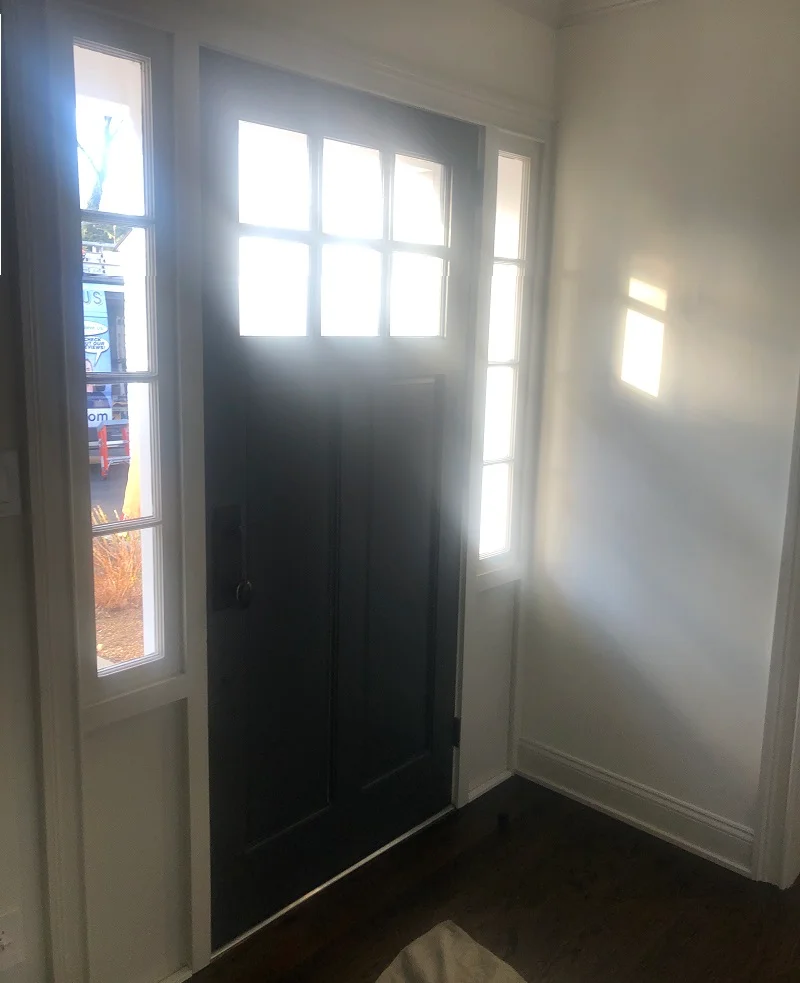 Interior view of old wood door which doesn't seal well